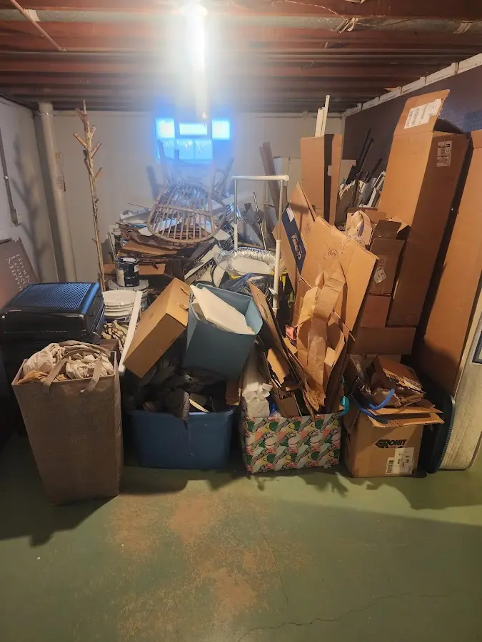 Roll-off dumpster container at job site for Yard Waste Dumpster Rental in Nantucket